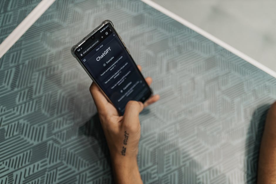artificial intelligence interface futuristic smartphone screen - 最新テック動向:iOS 26、iPhone 18 Pro、美団、AI進化