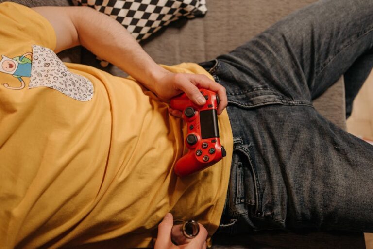 person playing video game - カプコン快進撃の秘密!新作200万本突破と業界牽引の戦略