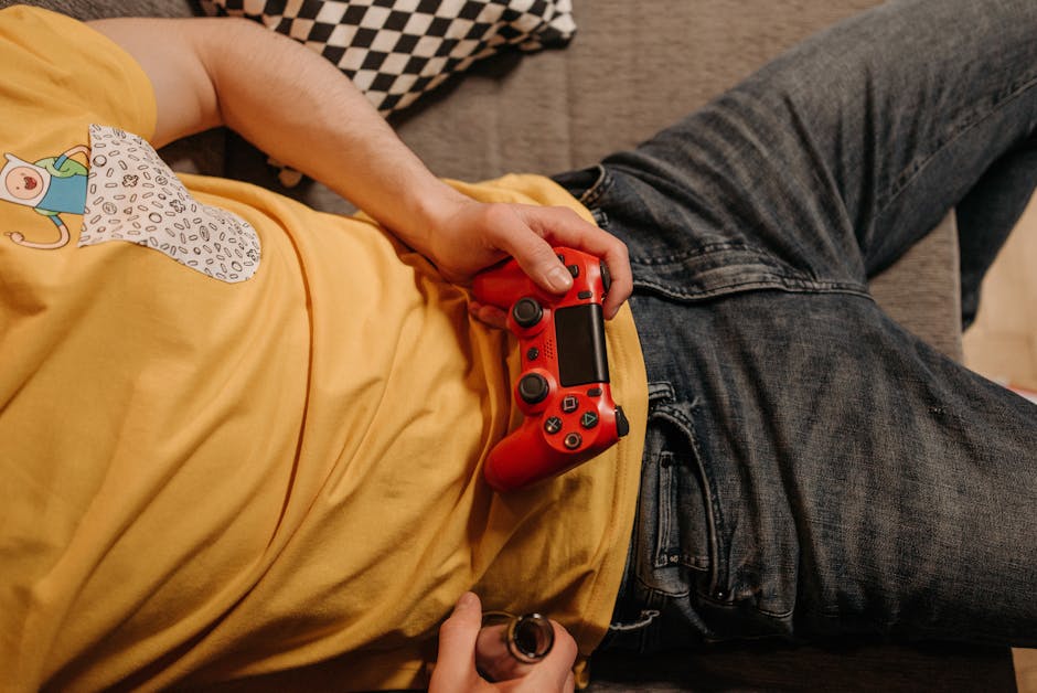 person playing video game - カプコン快進撃の秘密!新作200万本突破と業界牽引の戦略
