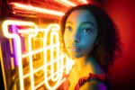 Neon emotional portrait Intense young woman - ドラマ「ユーフォリア」衝撃描写で論争!シドニー・スウィーニーの大胆演技は「自己否定」か?
